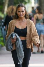 CHRISSY TEIGEN Out for Lunch with a Friend in Miami 03/31/2022