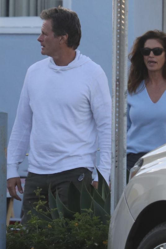 CINDY CRAWFORD and Rande Gerber Arrives at a Seafood Restaurant in Malibu 04/04/2022