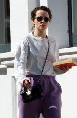 CLAIRE FOY Out and About in London 04/21/2022