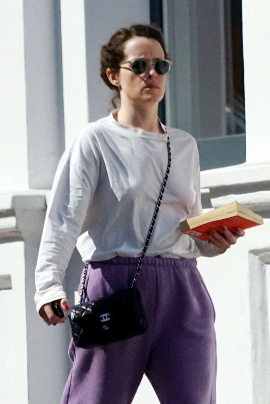 CLAIRE FOY Out and About in London 04/21/2022