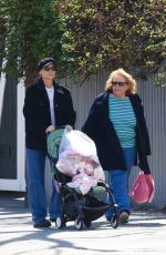 DIANE KRUGER Donate Baby Clothing to a Thrift Shop in New York 04/08/2022