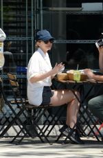 ELIZABETH OLSEN and Robbie Arnett at Hank