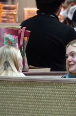 ELLE and DAKOTA FANNING Arrives in Miami 04/08/2022