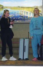 ELLE and DAKOTA FANNING Arrives in Miami 04/08/2022