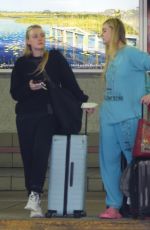 ELLE and DAKOTA FANNING Arrives in Miami 04/08/2022