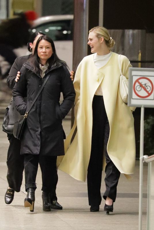 ELLE FANNING and LUCY LIU Leaves Dinner at Nobu in New York 03/31/2022