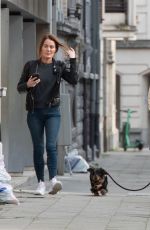 EMILIA CLARKE Out in Brussels to Filming The Pod Generation 03/13/2022