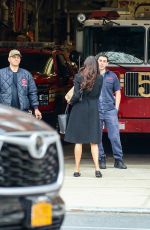 FAMKE JANSSEN Chats with Firemen of NYFD Out in New York 04/23/2022