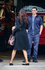 FAMKE JANSSEN Chats with Firemen of NYFD Out in New York 04/23/2022