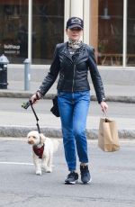 JULIANNA MARGUILES Out with Her Dog in New York 03/31/2022