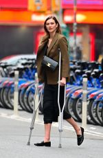 KARLIE KLOSS Walkong on Crutches Out in New York 04/05/2022