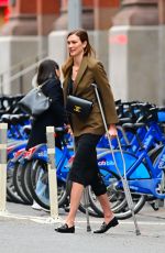 KARLIE KLOSS Walkong on Crutches Out in New York 04/05/2022