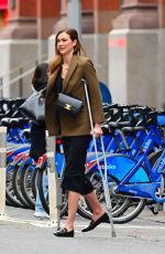 KARLIE KLOSS Walkong on Crutches Out in New York 04/05/2022