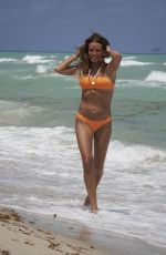 KELLY BENSIMON in Bikini at a Beach in Miami 04/23/2022