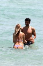 KIMBERLEY GARNER in Bikini at a Beach in Miami 04/27/2022