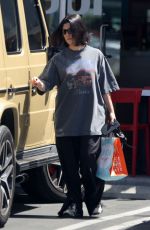 KOURTNEY KARDASHIAN and Travis Barker Out for Green Smoothies in Los Angeles 04/15/2022