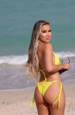 LISA OPIE, VICTORIA LARSON and ERICA PORRAS in Bikinis at a Beach in Miami 04/14/2022