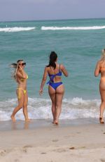LISA OPIE, VICTORIA LARSON and ERICA PORRAS in Bikinis at a Beach in Miami 04/14/2022