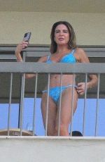 LUCIANA GIMENEZ in Bikini on Balcony of Her Hotel in Rio de Janeiro 04/22/2022