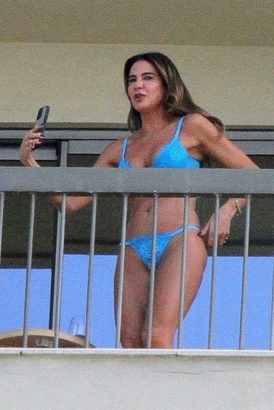 LUCIANA GIMENEZ in Bikini on Balcony of Her Hotel in Rio de Janeiro 04/22/2022