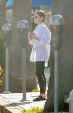 LUCY HALE Feeds Her Parking Meter in Studio City 04/09/2022