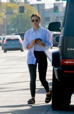 LUCY HALE Feeds Her Parking Meter in Studio City 04/09/2022