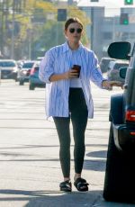 LUCY HALE Feeds Her Parking Meter in Studio City 04/09/2022