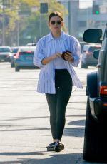 LUCY HALE Feeds Her Parking Meter in Studio City 04/09/2022