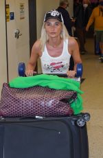 MEGAN MCKENNA Arrives at LAX Airport in Los Angeles 04/07/2022