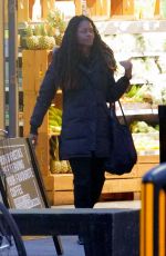NAOMIE HARRIS Shopping at Planet Organic in London 03/30/2022