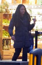 NAOMIE HARRIS Shopping at Planet Organic in London 03/30/2022