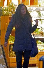 NAOMIE HARRIS Shopping at Planet Organic in London 03/30/2022