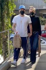NICOLA PELTZ and Brooklyn Beckham Shopping at Erewhon Market in Santa Monica 04/25/2022