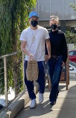 NICOLA PELTZ and Brooklyn Beckham Shopping at Erewhon Market in Santa Monica 04/25/2022
