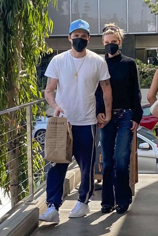 NICOLA PELTZ and Brooklyn Beckham Shopping at Erewhon Market in Santa Monica 04/25/2022
