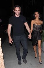 NICOLE SCHERZINGER and Thom Evans Night Out on Sunset Boulevard in Los Angeles 04/10/2022