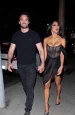 NICOLE SCHERZINGER and Thom Evans Night Out on Sunset Boulevard in Los Angeles 04/10/2022