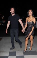 NICOLE SCHERZINGER and Thom Evans Night Out on Sunset Boulevard in Los Angeles 04/10/2022
