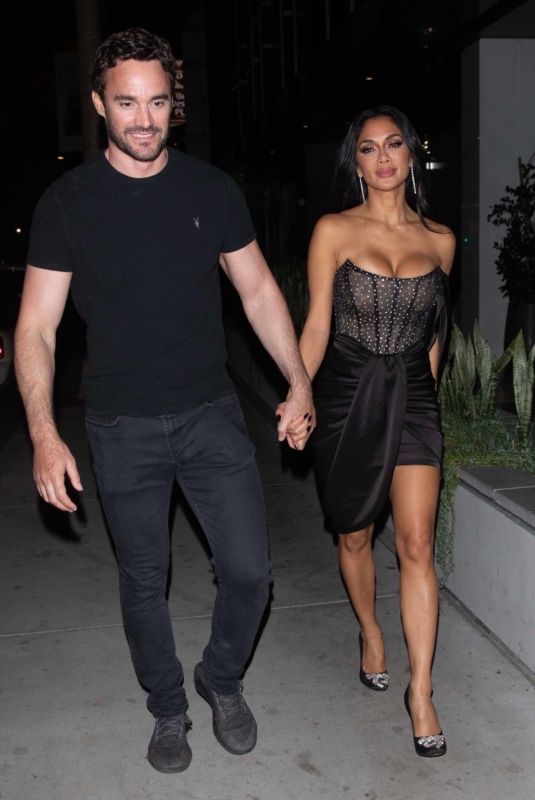 NICOLE SCHERZINGER and Thom Evans Night Out on Sunset Boulevard in Los Angeles 04/10/2022