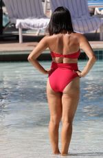 NIKKI BELLA in Bikini at a Pool in Indian Wells 04/17/2022