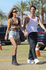 NINA AGDAL Arrives at Coachella in Indio 04/17/2022