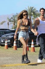 NINA AGDAL Arrives at Coachella in Indio 04/17/2022
