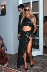 PARIS HILTON Leaves Revolve Party in West Hollywood 04/12/2022