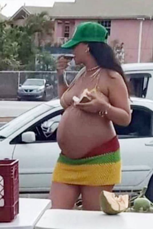 Pregnant RIHANNA at a Local Coconut Stand in Barbados 04/17/2022