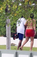 Pregnant RIHANNA in Bikini on Holiday in Barbados 04/18/2022