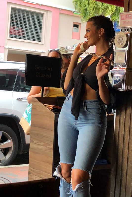PRISCILLA HUGGINS in Ripped Denim Out in Miami 04/04/2022