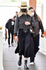 ROSAMUN PIKE at Marco Polo International Airport in Venice 04/24/2022
