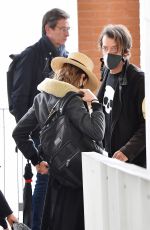 ROSAMUN PIKE at Marco Polo International Airport in Venice 04/24/2022