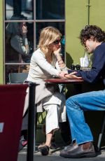 SIENNA MILLER and Oli Green Out in London 04/13/2022