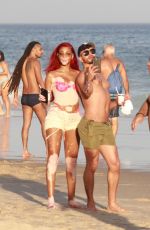 WINNIE HARLOW in Bikini at Ipanema Beach 04/23/2022